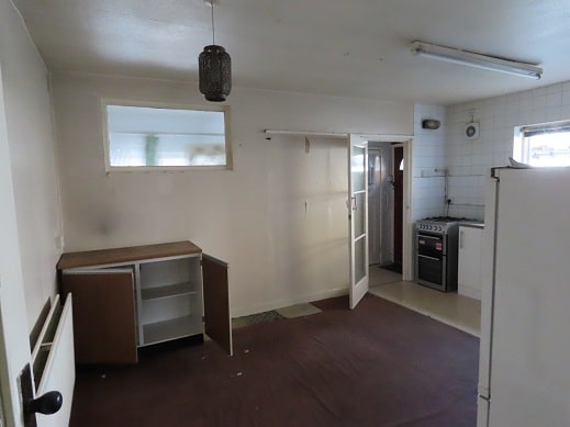 Old kitchen to be ripped out at bungalow conversion project in ware, Hertfordshire