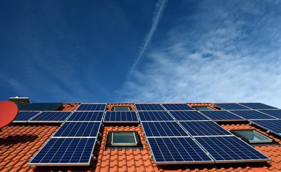 Solar panels installed on a roof - green tech in property development